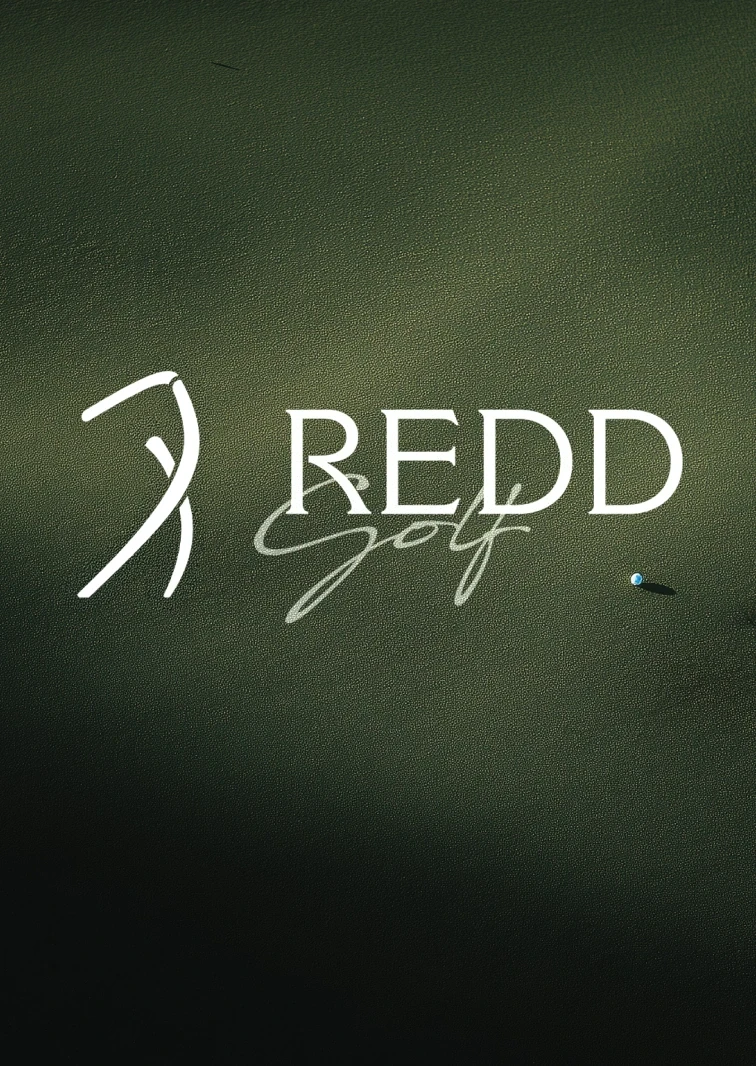 Redd Golf strip card: the symbol and wordmark on course green